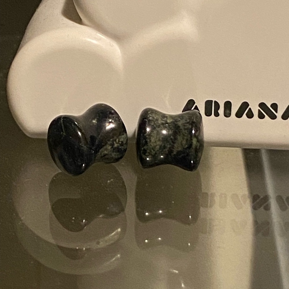 Stone plugs for stretched piercings